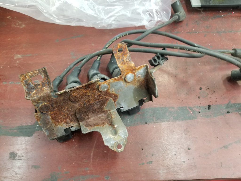 0408 rx8 engine used ignition coils (4) with engine mounting bracket