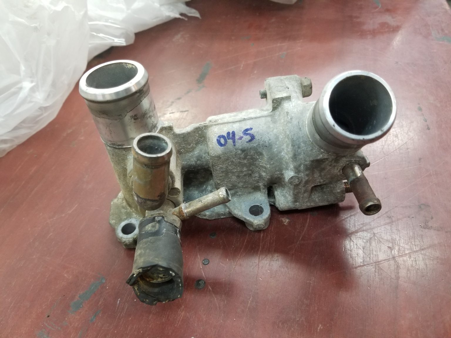 0405 rx8 engine aluminum coolant thermostat housing Rotary Resurrection